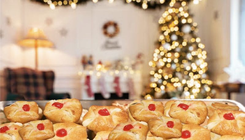 image of cheese danish in front of Christmas tree